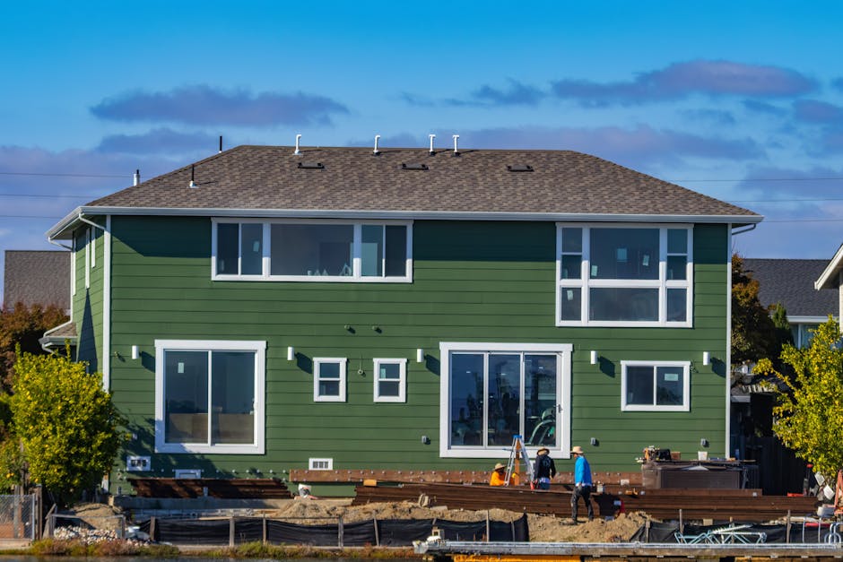 New vinyl house siding installation